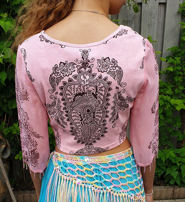 Shirt met pauw print en doorzichtige mouw in roze